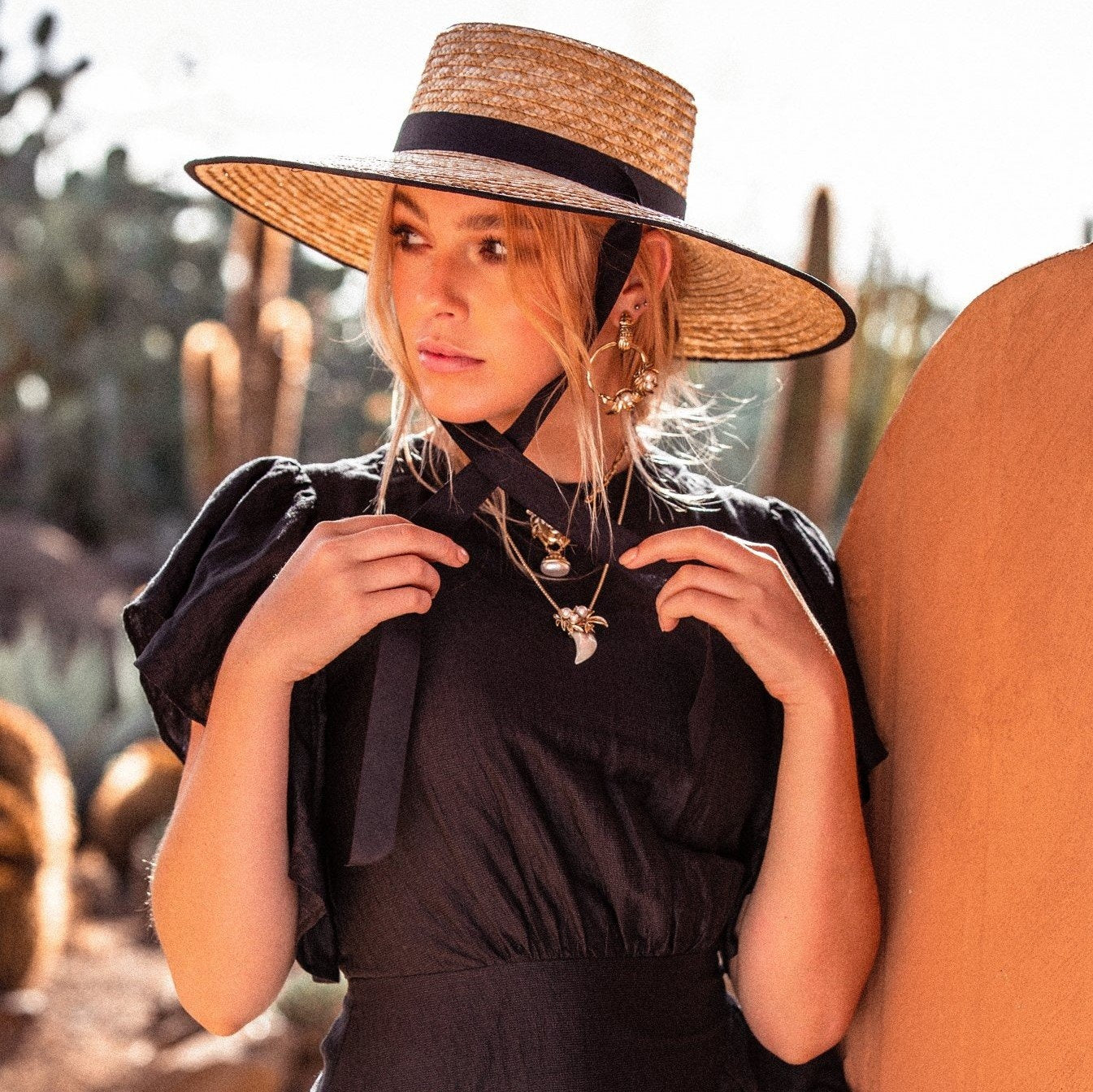 roseaum-boater-natural-with-black-trim