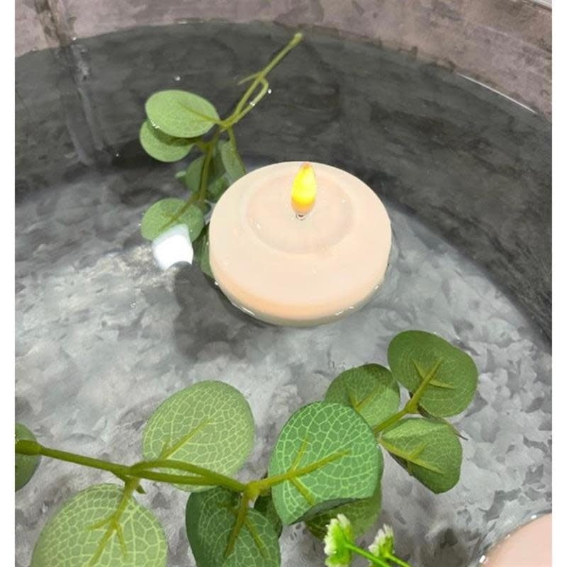 ivory-led-floating-candles-s-2