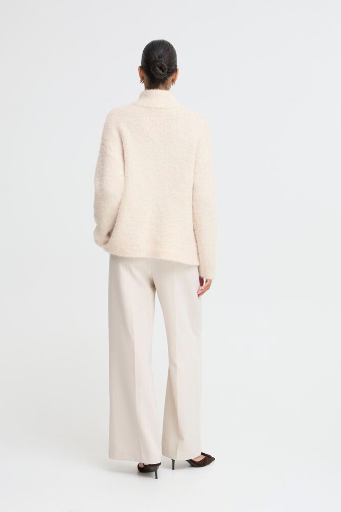 Omanta Half Zip Sweater